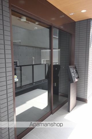 OーCREST池田桃園の玄関写真