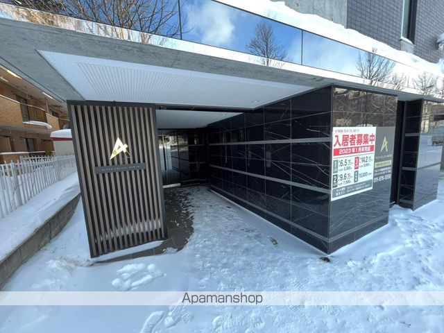アルファスクエア宮の森2条の玄関写真
