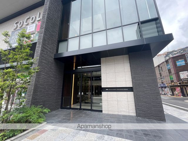 プラウド阪急塚口駅前の玄関写真