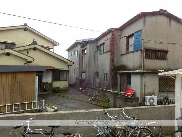 エクステンド谷山の玄関写真