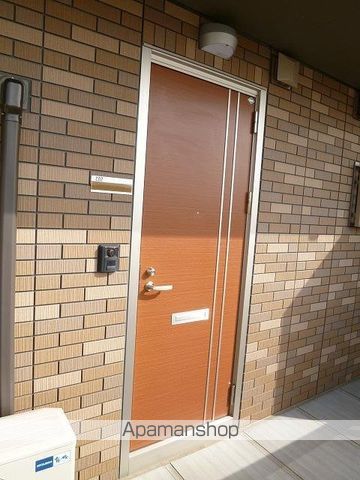 レジデンス牟礼南B棟の玄関写真