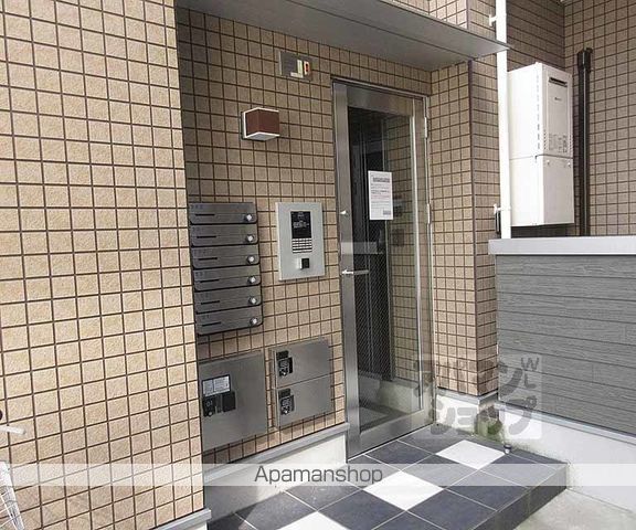 ハーモニーテラス東野狐藪町IIの玄関写真