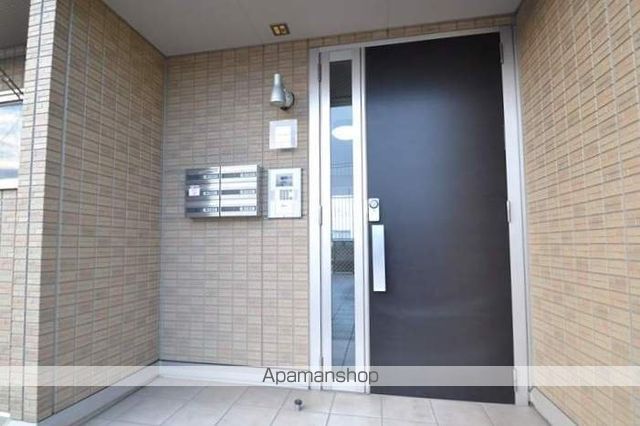 メゾン エミグラント B棟の玄関写真