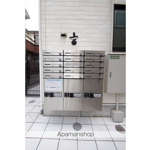 アパルトメント梅丘グランデの玄関写真