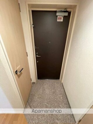 ユニゾンタワー[2LDK/64.7m2]の玄関