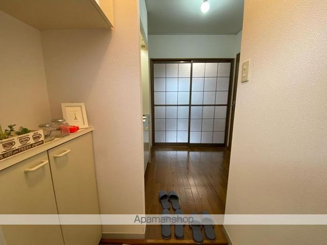 シャトル西春日Ａ・Ｂ棟[1K/23.4m2]の玄関