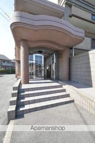 プレステージ塔原の玄関写真
