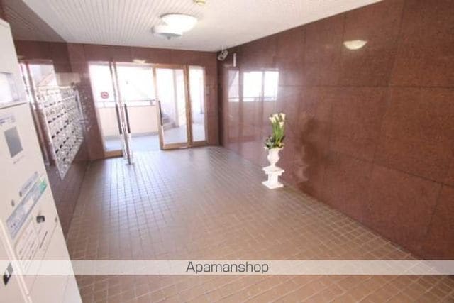 迫マンションの玄関写真