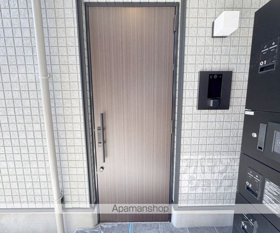 ハーモニーテラス淀新町IIの玄関写真