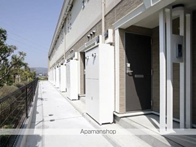 レオネクストうちなーの玄関写真