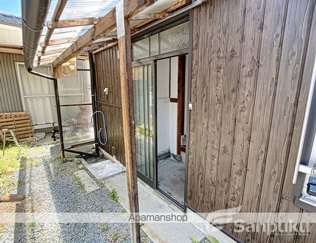 松山市 1階建 築60年の玄関写真