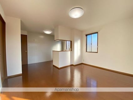 リビングタウン松縄Ａ・Ｂ・Ｃ棟[2LDK/63.98m2]のリビング・居間