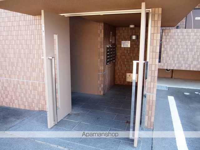 グランドハイツこまちの玄関写真