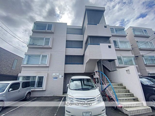 ビッグバーンズマンション北郷IIIAの外観写真