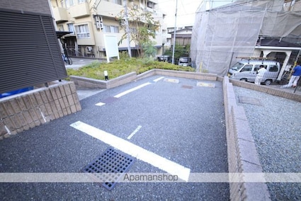 レオネクストムーンハウス[1K/27.47m2]の駐車場2