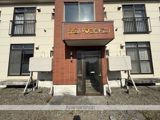 まるいマンションの玄関写真