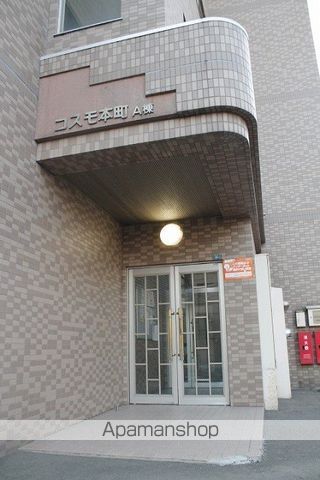 コスモ本町の玄関写真