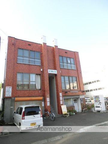 21条ビルの外観写真