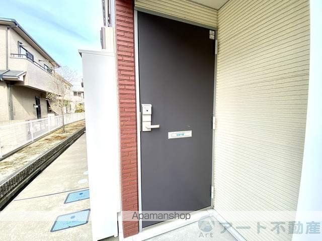 レオネクスト段々の玄関写真
