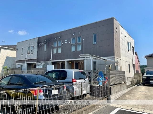 REプロニティB棟の外観写真