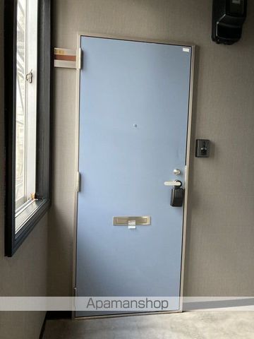 米山ビルの玄関写真