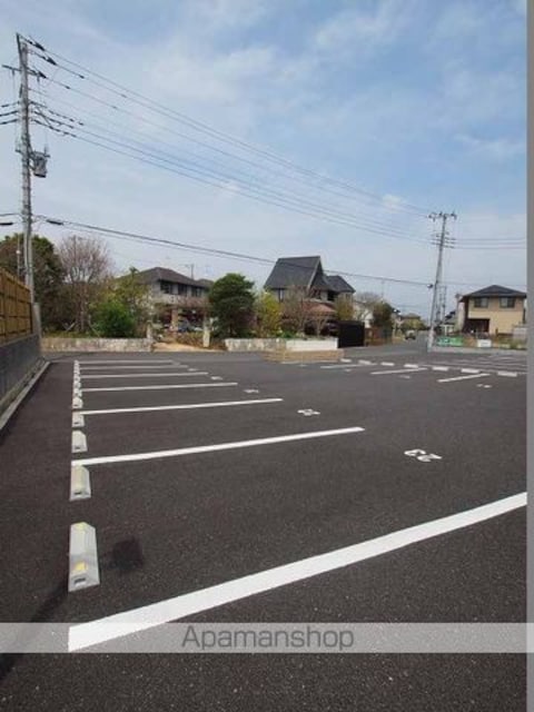 サンシャインヒルズ厨[1LDK/49.68m2]の駐車場1