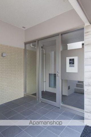 M・ピースの玄関写真