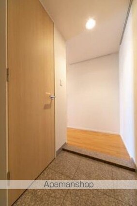ユニゾンタワー[1LDK/52.75m2]の玄関