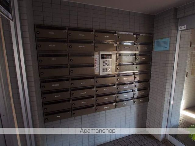 サムティ学園前の玄関写真