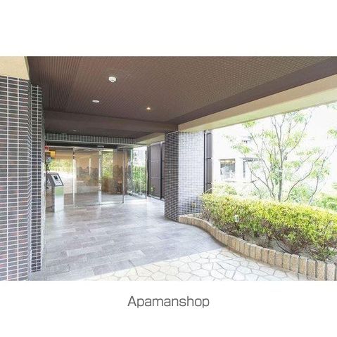 プレアデス千里山田の玄関写真