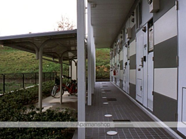 レオパレス山田池リバーサイドの玄関写真