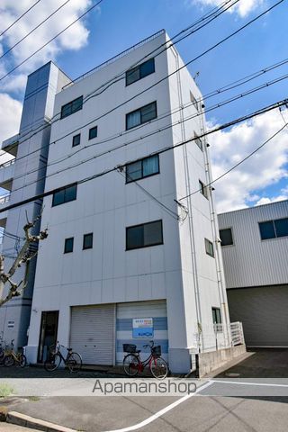 新在家マンションの外観写真