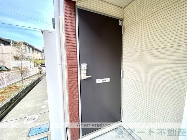 レオネクスト段々の玄関写真