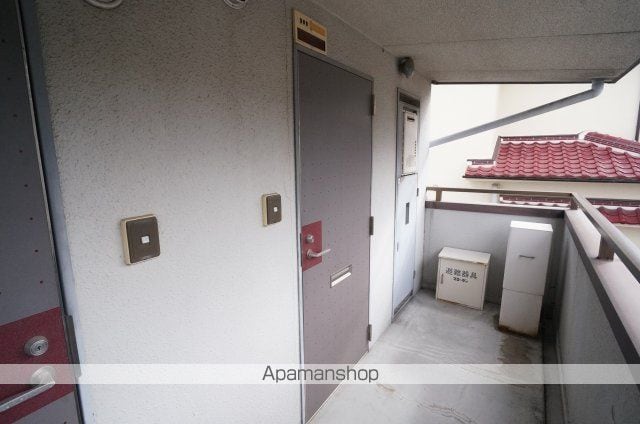 信貴マンションの玄関写真