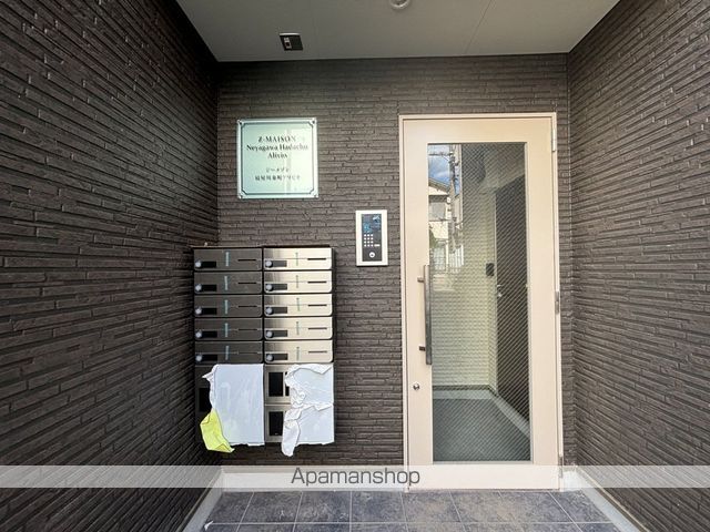 ジーメゾン寝屋川泰町アリビオの玄関写真