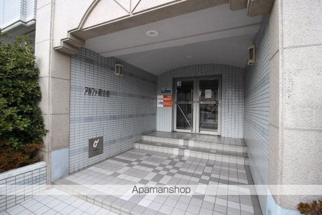アルファ西古松の玄関写真