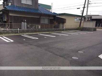 ホワイトクレイン野洲[1LDK/40.26m2]の駐車場1