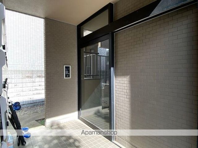 ミレニアム経堂の玄関写真