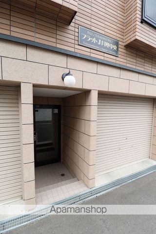 フラットJ月寒中央の玄関写真