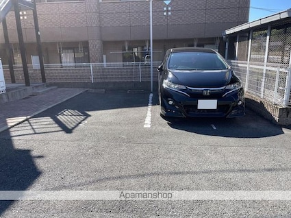 レオパレスさくら[1K/19.87m2]の駐車場2