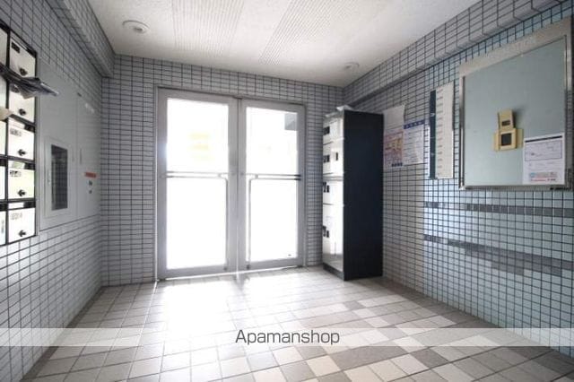 アルファ西古松の玄関写真
