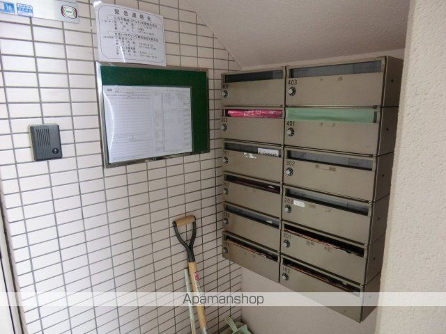 ビッグバーンズマンション北郷IIIAの玄関写真