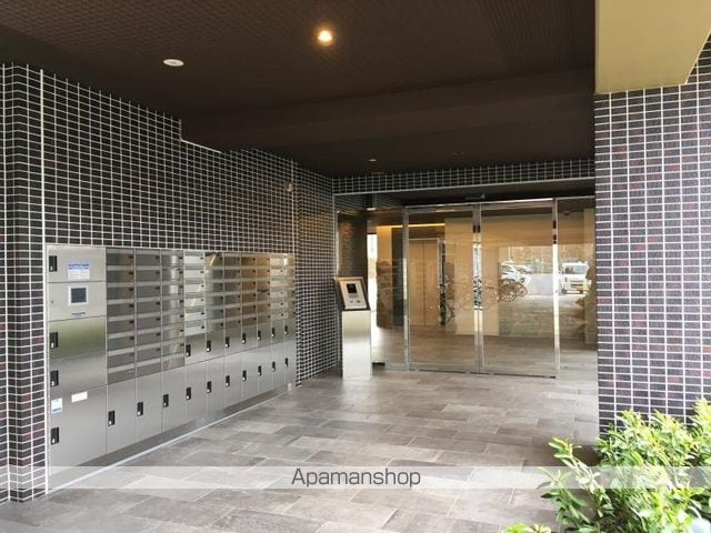 プレアデス千里山田の玄関写真