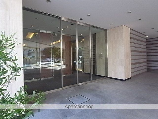 近鉄難波・奈良線 学園前駅 徒歩4分 8階建 築22年の玄関写真