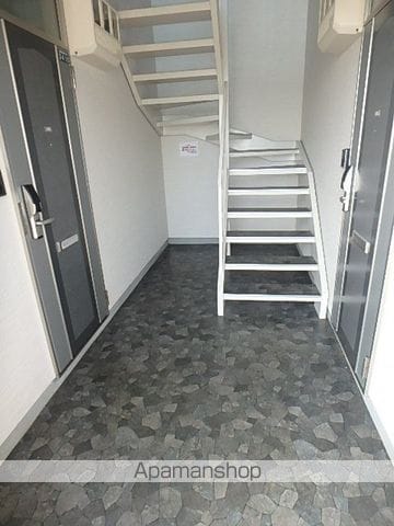 砂川市 2階建 築14年の玄関写真