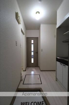 ドミールＴＯＭＯ[1K/23.18m2]の玄関