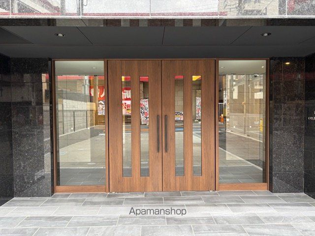 プレサンスNEO大和田STATIONベゼルの玄関写真