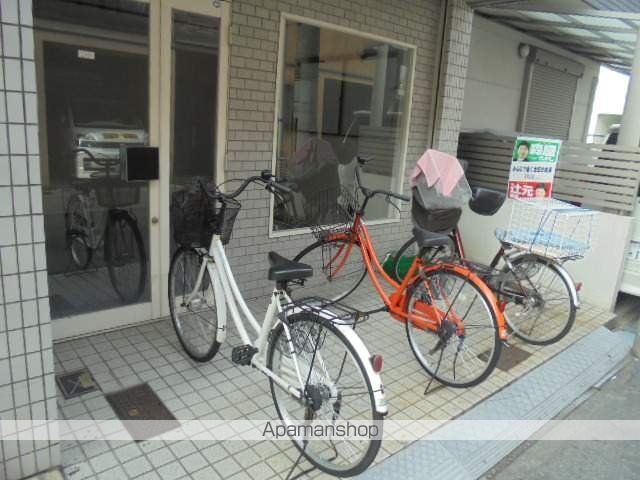 羊燈館メゾン香里園緑町の玄関写真