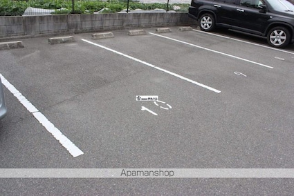 レオパレスＲａｄｉａｎｔ時宗[1K/20.28m2]の駐車場