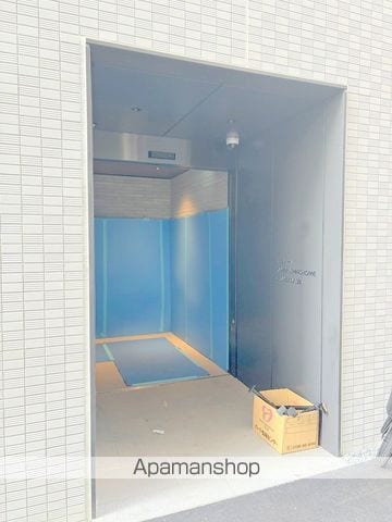 レジュールアッシュ谷町四丁目グランクラスの玄関写真
